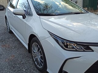 2022 Toyota Corolla XII (E210), белый, 1710000 рублей, вид 2