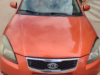 2010 Kia Rio II Рестайлинг, оранжевый, 500000 рублей, вид 1