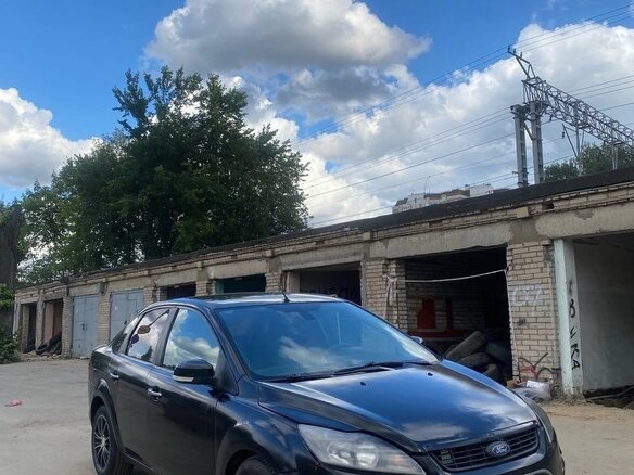 2009 Ford Focus II Рестайлинг, чёрный - вид 1