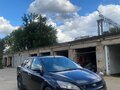 2009 Ford Focus II Рестайлинг, чёрный - вид 1