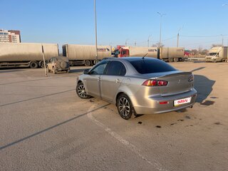 2011 Mitsubishi Lancer X Рестайлинг, серебристый, 600000 рублей, вид 3