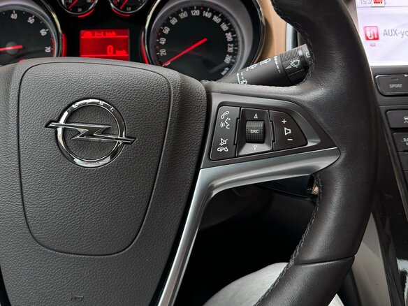 2014 Opel Astra J Рестайлинг, коричневый, 1360000 рублей - вид 7