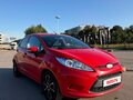 2009 Ford Fiesta Mk6, красный - вид 1
