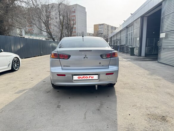 2013 Mitsubishi Lancer X Рестайлинг, серебристый, 785000 рублей - вид 4