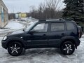 2015 Chevrolet Niva I Рестайлинг, чёрный, 700000 рублей - вид 1