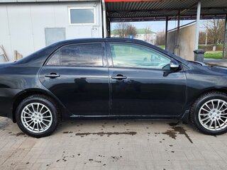 2011 Toyota Corolla X (E140, E150) Рестайлинг, чёрный, 800000 рублей, вид 4