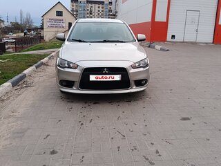 2012 Mitsubishi Lancer X Рестайлинг, серебристый, 780000 рублей, вид 2