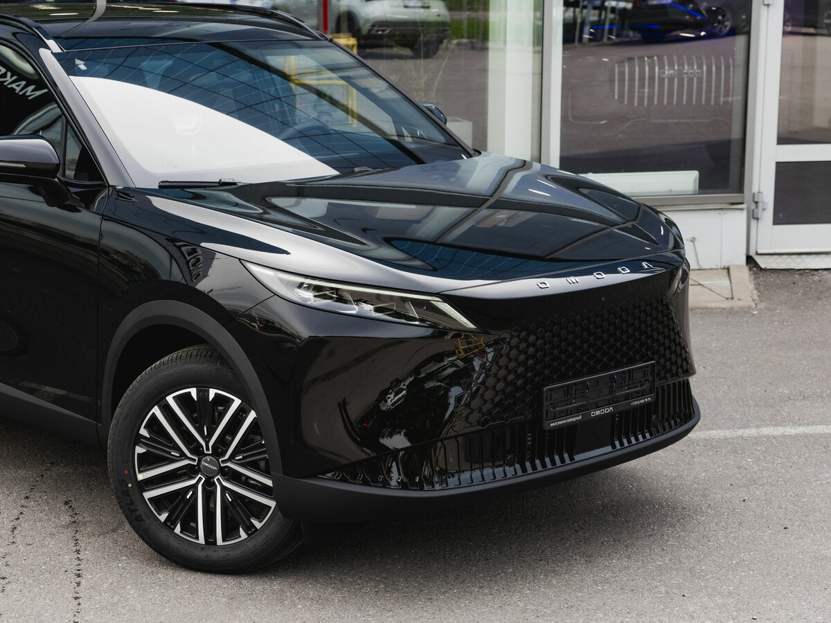 Открыть фотографии: Omoda C7