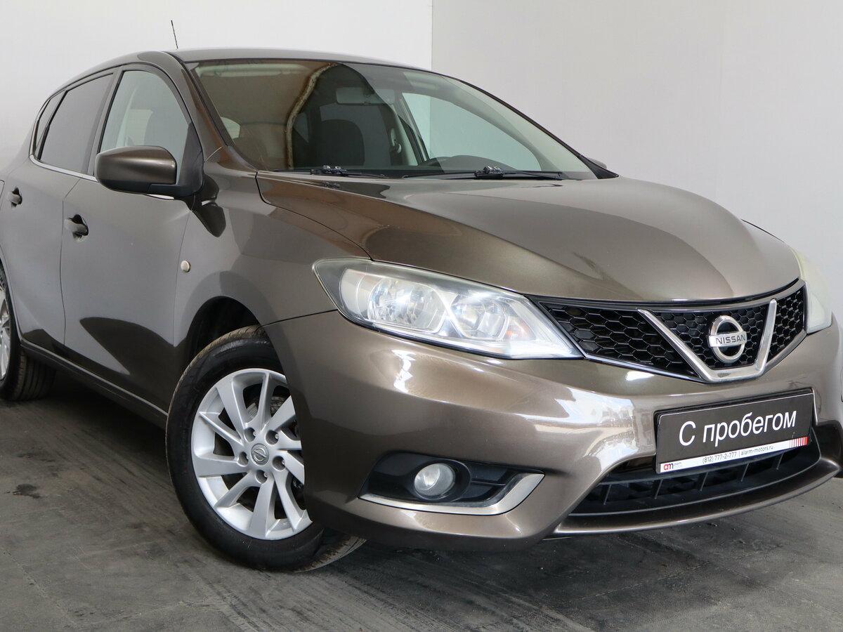 Открыть фотографии: Nissan Tiida II