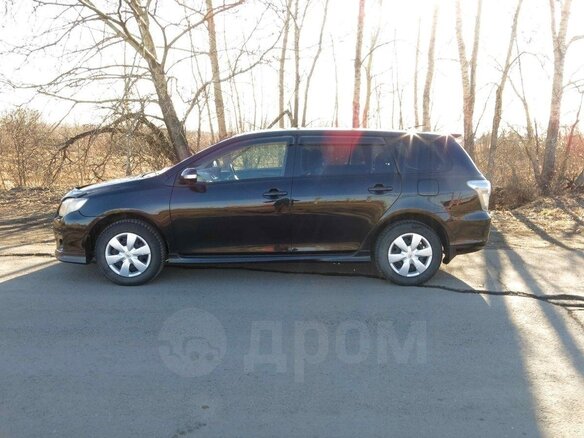2011 Toyota Corolla Fielder X (E140, E150) Рестайлинг, чёрный, 750000 рублей - вид 10