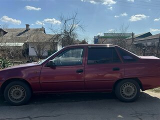 2013 Daewoo Nexia I Рестайлинг, пурпурный, 280000 рублей, вид 3