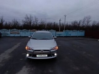 2012 Mitsubishi Lancer X Рестайлинг, серебристый, 750000 рублей, вид 2