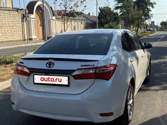 2013 Toyota Corolla XI (E160, E170, E180), белый, 1090000 рублей - вид 2