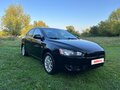2010 Mitsubishi Lancer X, чёрный, 685000 рублей - вид 3