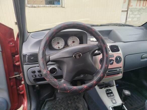 2007 Tata Indigo I, пурпурный, 300000 рублей - вид 12