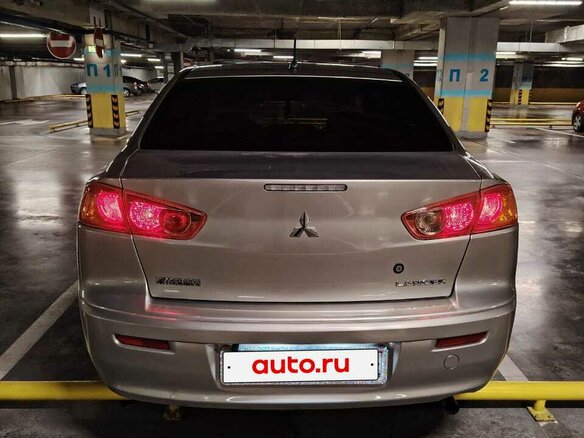 2007 Mitsubishi Lancer X, бежевый, 600000 рублей - вид 9