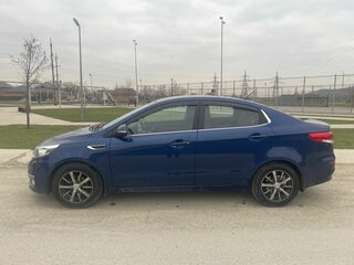 2015 Kia Rio 6-speed III, синий, 900000 рублей, вид 4