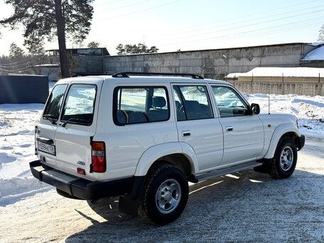 1997 Toyota Land Cruiser 80 Series Рестайлинг, белый, 2350000 рублей, вид 4