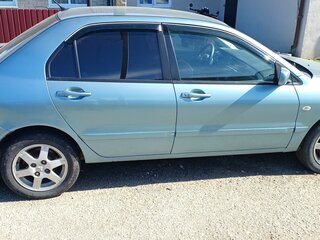 2006 Mitsubishi Lancer IX Рестайлинг, голубой, 430000 рублей, вид 2