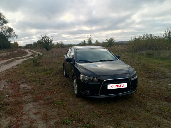 2008 Mitsubishi Lancer X, чёрный, 650000 рублей - вид 32