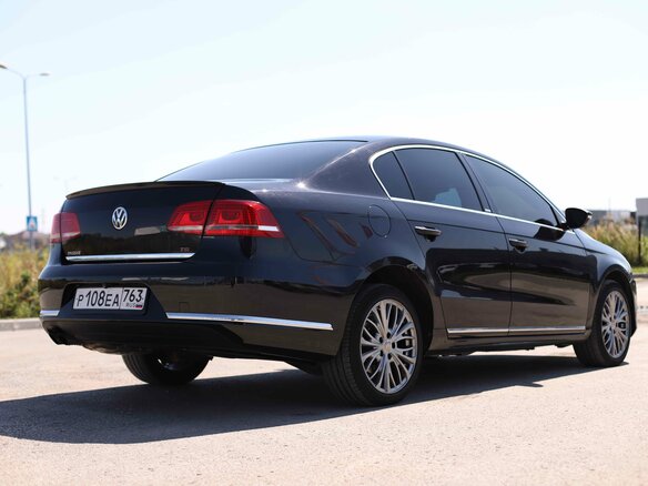 2014 Volkswagen Passat B7, чёрный, 1125823 рублей - вид 4