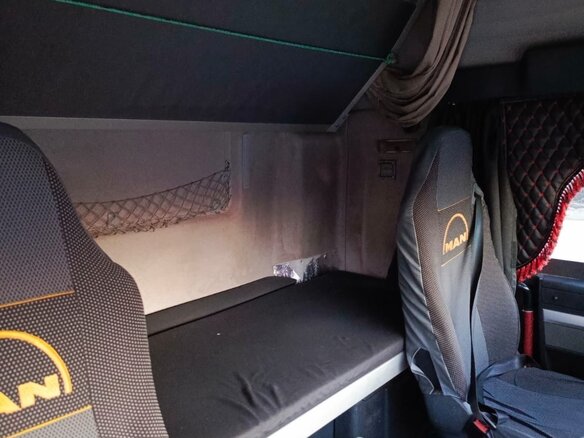 2011 MAN TGX, красный, 2350000 рублей - вид 5