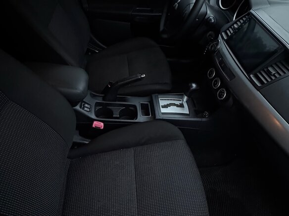 2010 Mitsubishi Lancer X, чёрный, 685000 рублей - вид 9