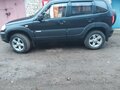 2014 Chevrolet Niva I Рестайлинг, чёрный - вид 1