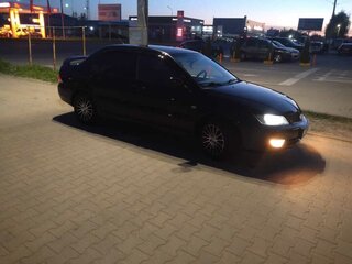 2006 Mitsubishi Lancer IX Рестайлинг, чёрный, 450000 рублей, вид 2