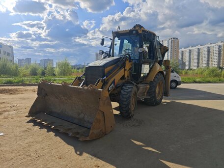 2011 Caterpillar 428, жёлтый, 4200000 рублей, вид 4