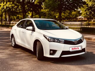 2014 Toyota Corolla XI (E160, E170, E180), белый, 1299990 рублей, вид 3