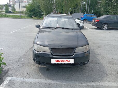 2010 Daewoo Nexia I Рестайлинг, чёрный, 100000 рублей, вид 1