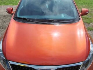 2013 Kia Sportage III, оранжевый, 1350000 рублей, вид 2