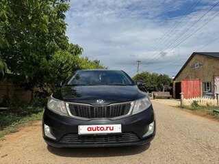 2012 Kia Rio 5-speed III, чёрный, 650000 рублей, вид 1