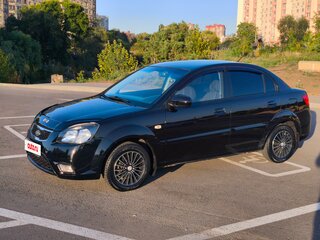 2010 Kia Rio II Рестайлинг, чёрный, 505000 рублей, вид 2