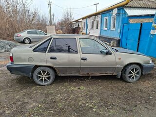 2001 Daewoo Nexia I, коричневый, 55000 рублей, вид 2