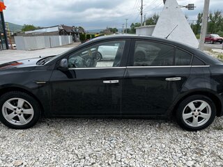 2010 Chevrolet Cruze I, чёрный, 560000 рублей, вид 3