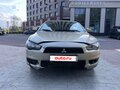2007 Mitsubishi Lancer X, бежевый, 330000 рублей - вид 1