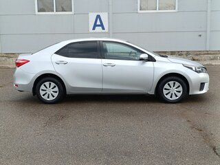2014 Toyota Corolla XI (E160, E170, E180), серебристый, 1169000 рублей, вид 4