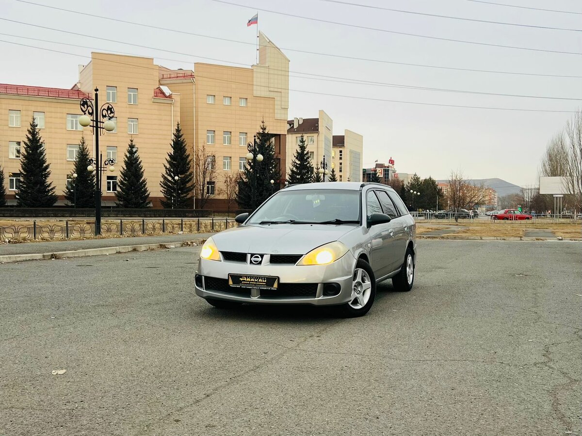 Открыть фотографии: Nissan Wingroad II (Y11) Рестайлинг