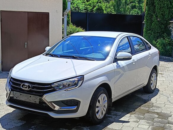 2023 Lada (ВАЗ) Vesta I Рестайлинг (NG), белый, 1370000 рублей - вид 2