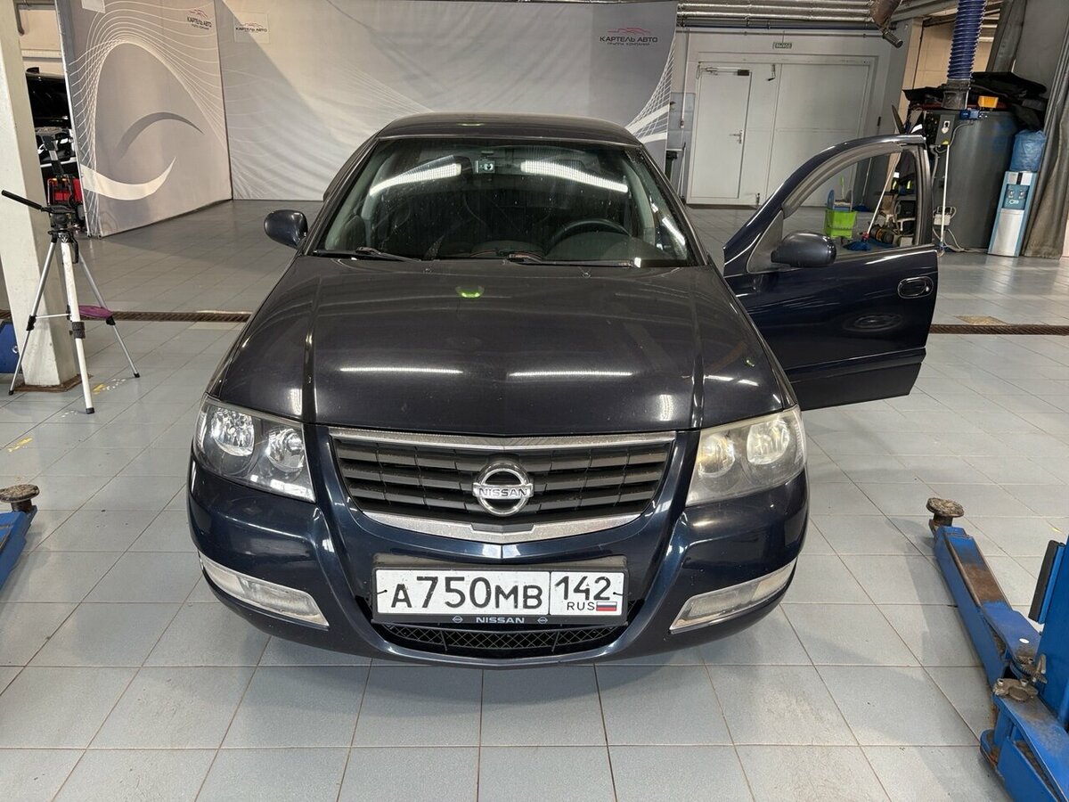 Открыть фотографии: Nissan Almera Classic I