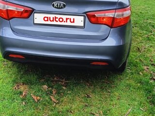 2013 Kia Rio 5-speed III, голубой, 850000 рублей, вид 4