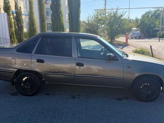 2003 Daewoo Nexia I, коричневый, 145000 рублей, вид 4