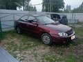2007 Kia Spectra I Рестайлинг 2, красный, 180000 рублей - вид 4