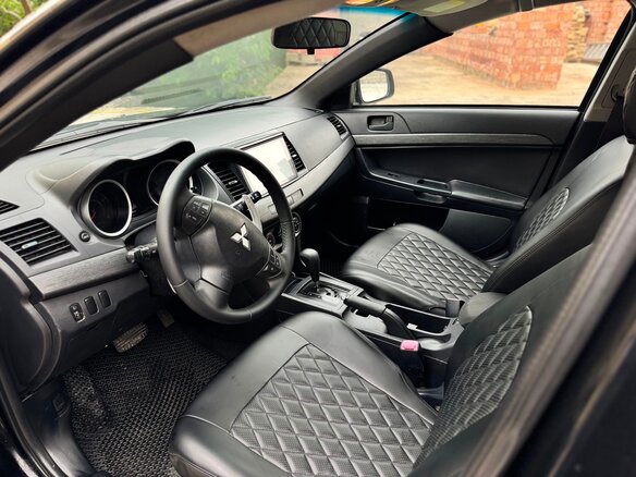 2012 Mitsubishi Lancer X Рестайлинг, чёрный, 750000 рублей - вид 9