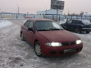 1997 Mitsubishi Carisma I, пурпурный, 180000 рублей, вид 2