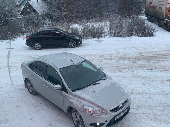 2010 Ford Focus II Рестайлинг, серебристый, 470000 рублей - вид 4