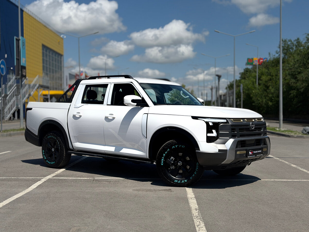 Открыть фотографии: Nissan Frontier Pro