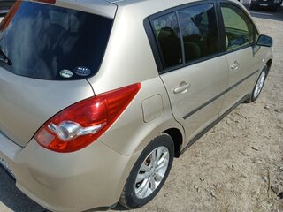 2009 Nissan Tiida I, золотистый, 620000 рублей, вид 5